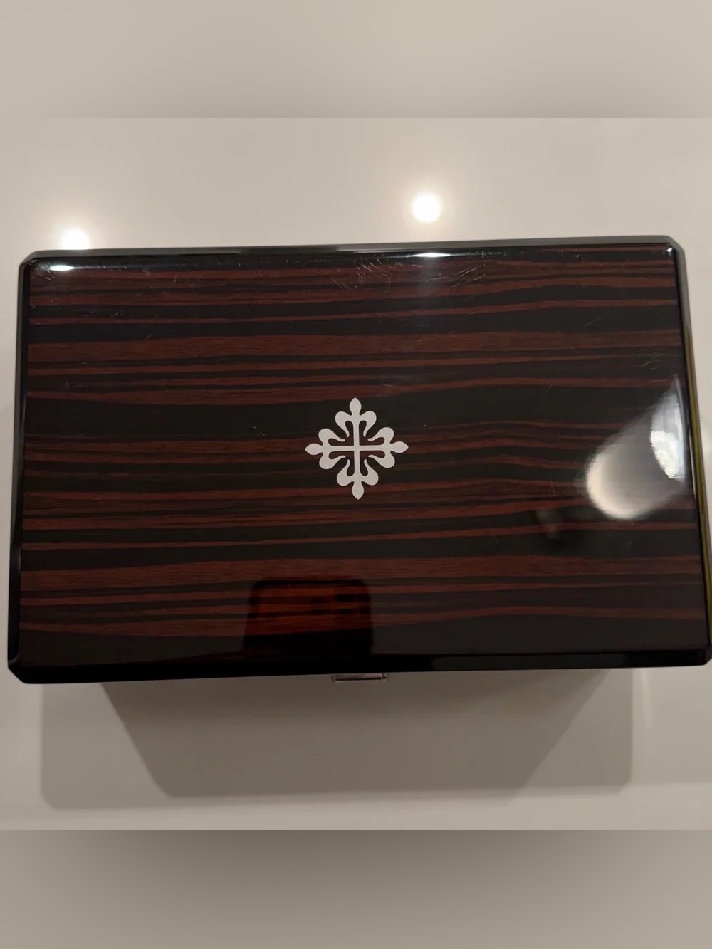 Patek Philippe Dark Brown Wood Grain Watch Box With Silver Emblem